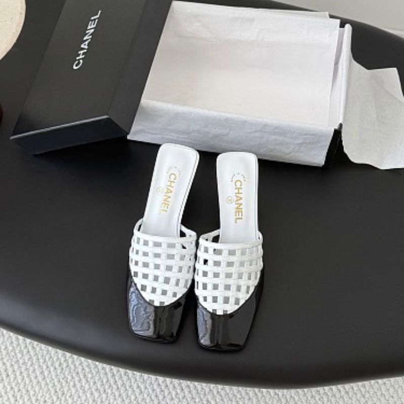 Chanel Interlocking Woven Toe-Cap Mules.