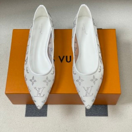 Louis Vuitton Gala Flat Ballerinas in white.
