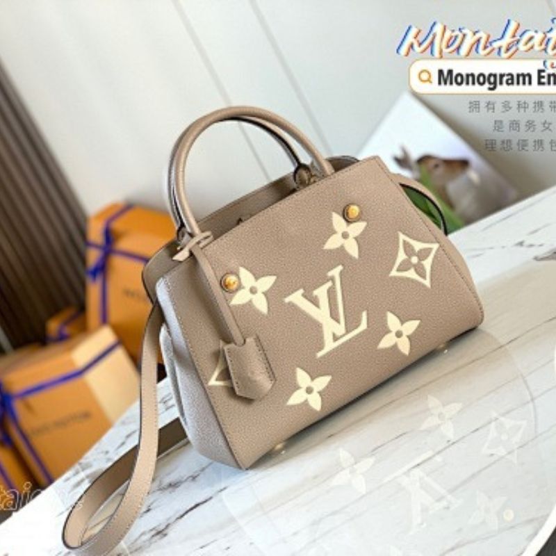 Louis Vuitton Montaigne BB in bicolor Monogram Empreinte leather.
