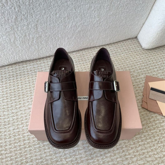 Miu Miu Buffalo Leather Buckle Loafers.
