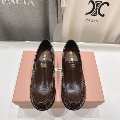 Miu Miu Logo-Embossed Slip-On Loafers