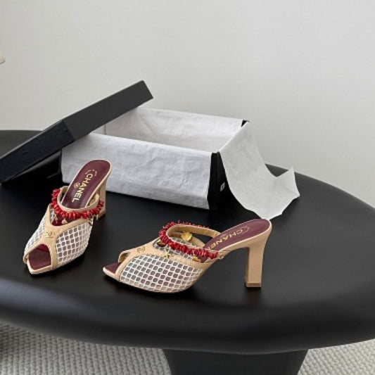 Chanel Coral Charm Mesh Open-Toe Mules in beige and burgundy.