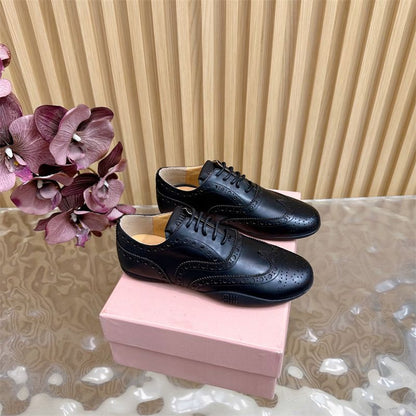 Miu Miu Leather Brogue Shoes.