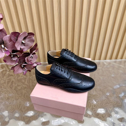 Miu Miu Leather Brogue Shoes.