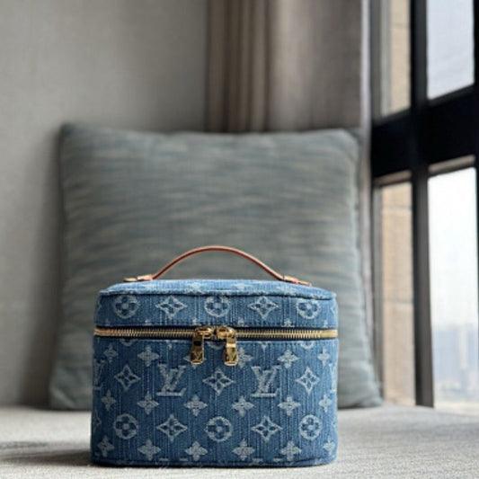 Louis Vuitton Nice Mini Vanity Case in Monogram Denim.