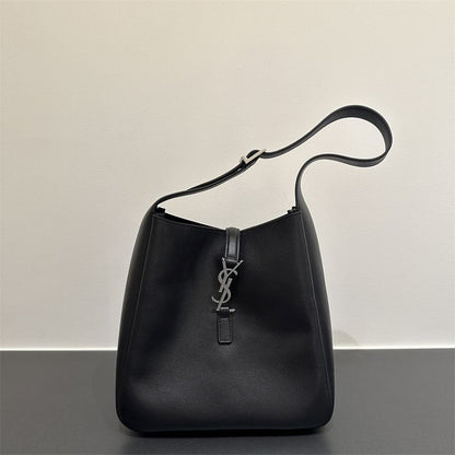 Saint Laurent Le 5 à 7 supple large hobo bag in black leather.