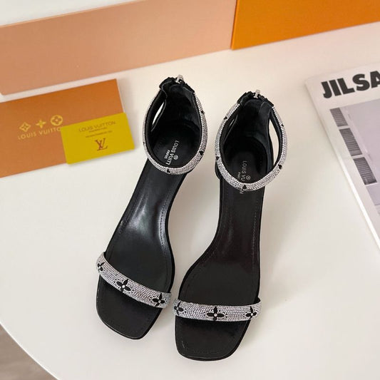 Louis Vuitton sandal with  black leather, crystal-strap design