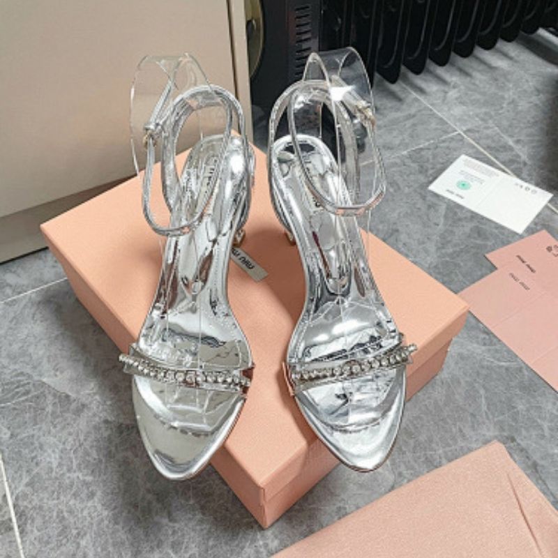 Miu Miu Metallic Leather Sandals with Crystal-Embellished Straps.