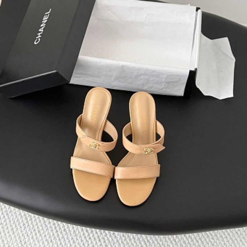 Chanel Crinkled Calfskin Double-Strap Mules in beige.