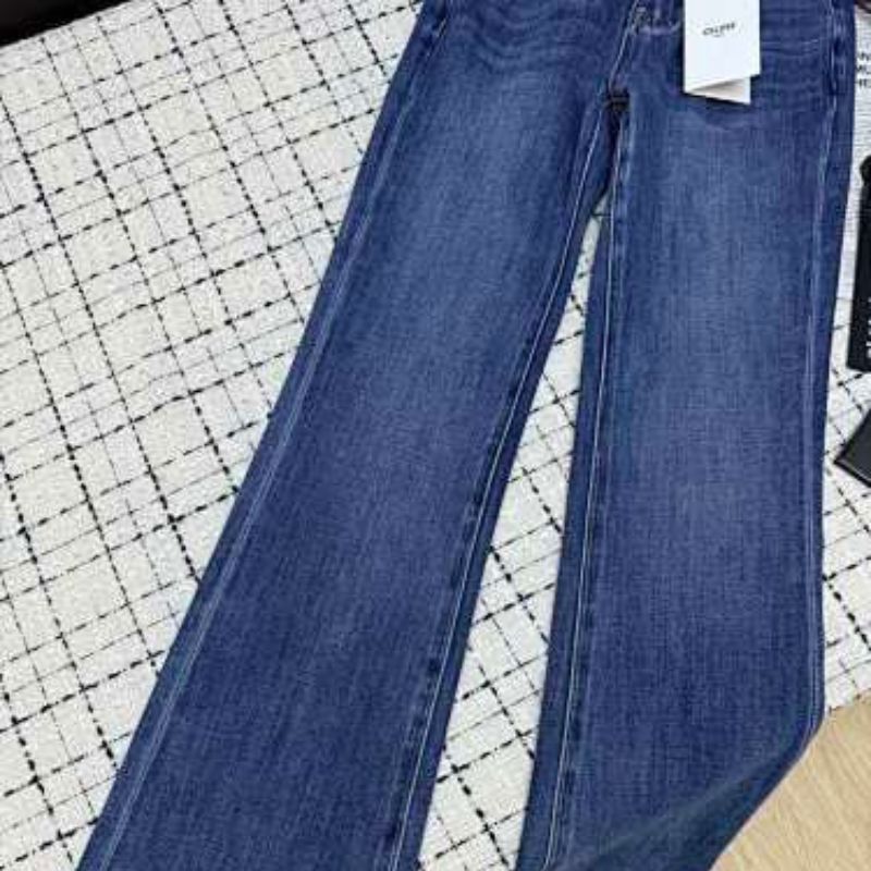 Celine flared denim jeans with a medium blue wash.