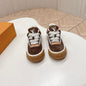 Louis Vuitton LV Skate Sneaker in the chocolate brown and gum colorway.