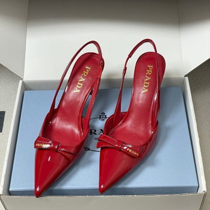 Prada Vernice Patent Leather Bow Slingback Pumps.
