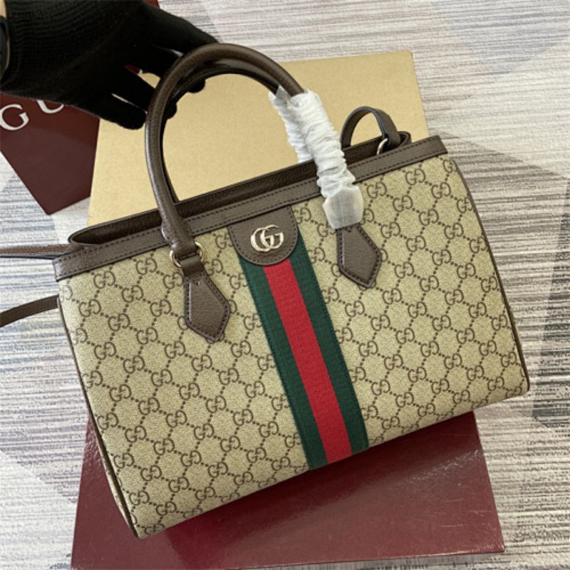Gucci Ophidia Medium Tote Bag in GG Supreme canvas.