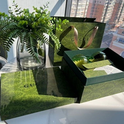 Gucci green-tinted glassware,
