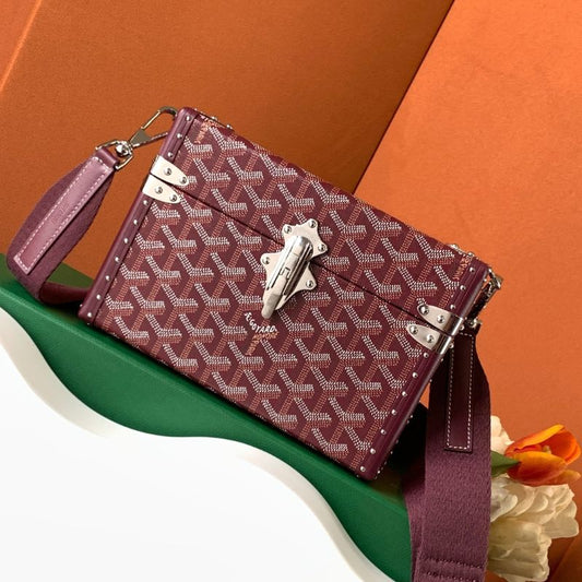 Goyard Cassette Trunk Bag in the rich burgundy