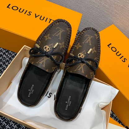 Louis Vuitton Gloria Flat Loafer in the classic Monogram canvas