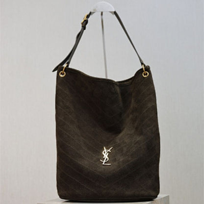 Saint Laurent Niki Supple Bucket Bag in brown quilted suede.