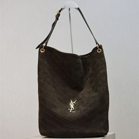Saint Laurent Niki Supple Bucket Bag in brown quilted suede.
