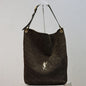 Saint Laurent Niki Supple Bucket Bag in brown quilted suede.
