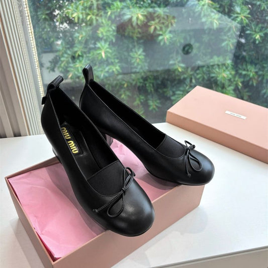 Miu Miu 65mm Bow-Detail Block-Heel Pumps in black leather