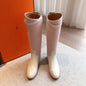 Hermès Jumping Boots in a seasonal pastel pink canvas
