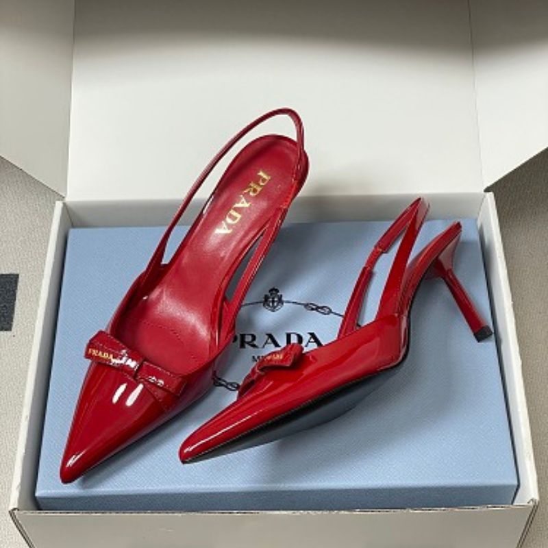 Prada Vernice Patent Leather Bow Slingback Pumps.