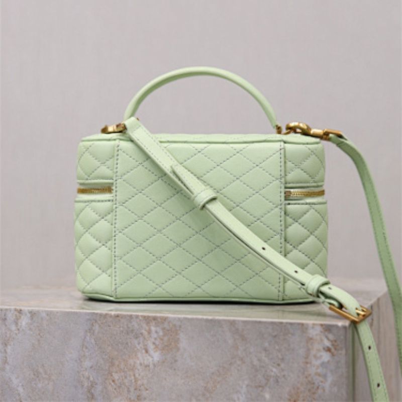 Saint Laurent Gaby Vanity Bag in a pale green shade.