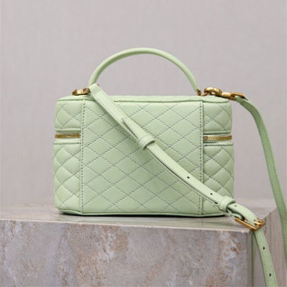 Saint Laurent Gaby Vanity Bag in a pale green shade.
