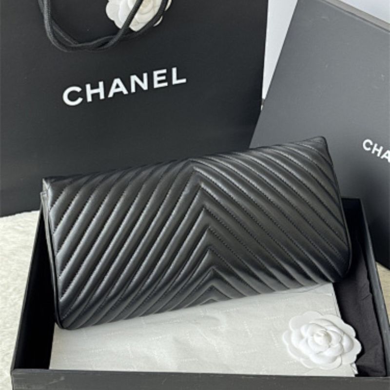 Chanel "Fold Up Again" Chevron Quilted Clutch.
