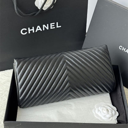 Chanel "Fold Up Again" Chevron Quilted Clutch.