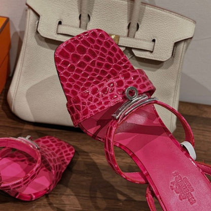 Hermès Lipstick 85 Sandals in a vibrant magenta pink alligator-embossed leather.