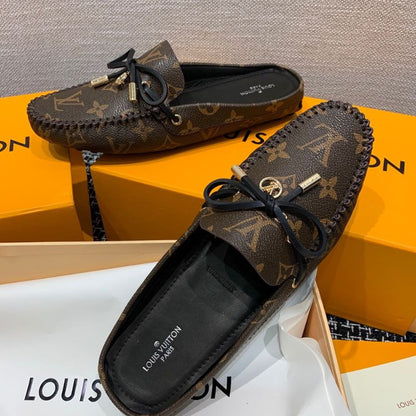Louis Vuitton Gloria Flat Loafer in the classic Monogram canvas