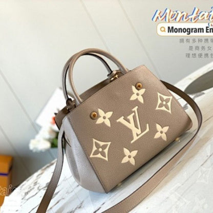 Louis Vuitton Montaigne BB in bicolor Monogram Empreinte leather.