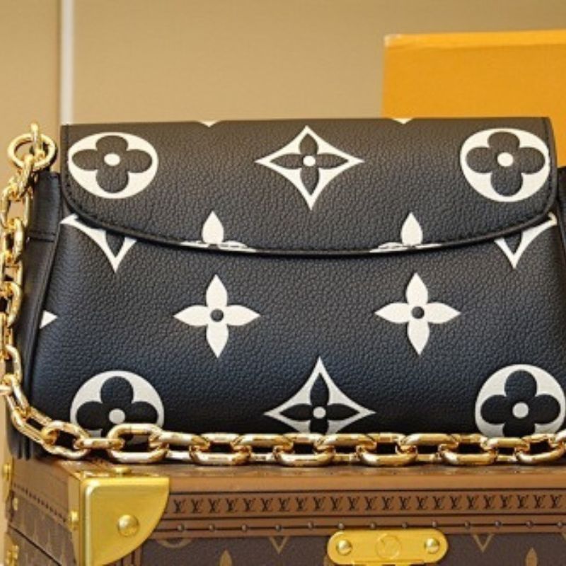 Louis Vuitton Favorite in Bicolour Monogram Empreinte leather