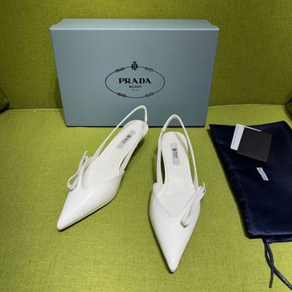 Prada Vernice Patent Leather Bow-Detail Slingback Pumps.