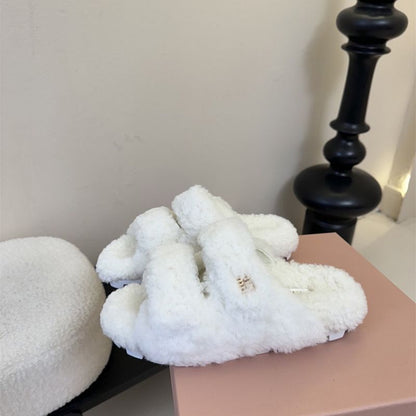 Miu Miu Natural Shearling Slides.