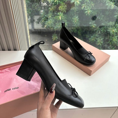 Miu Miu 65mm Bow-Detail Block-Heel Pumps in black leather