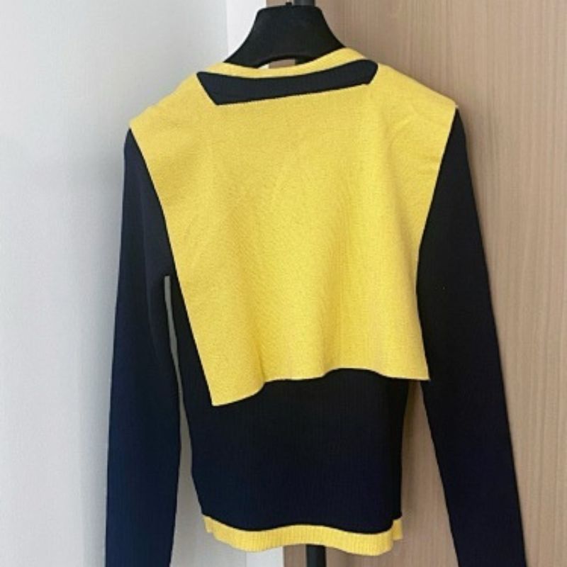 Christian Dior sweater with yellow accents.