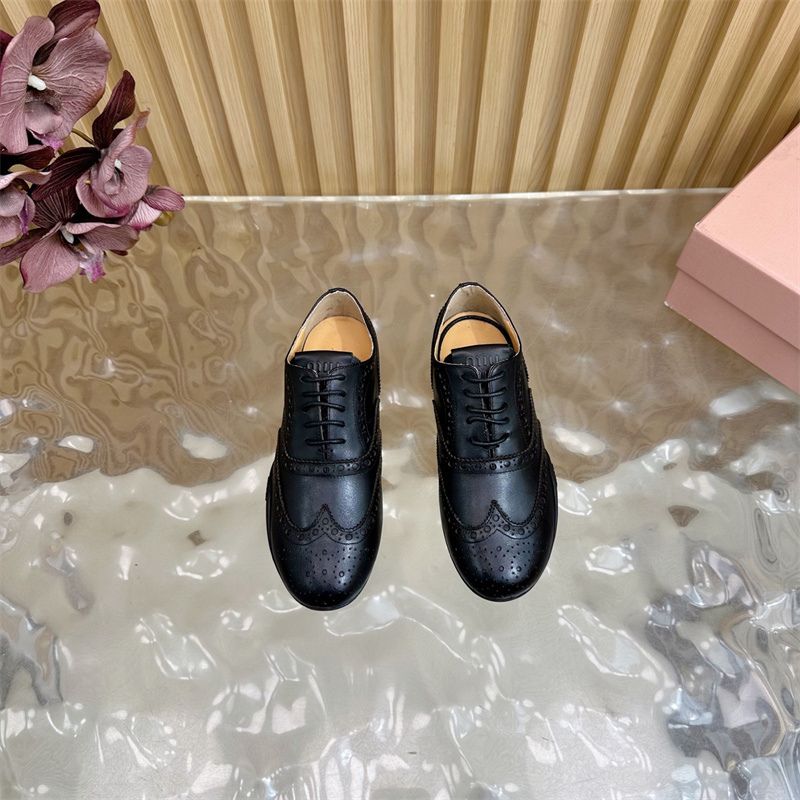 Miu Miu Leather Brogue Shoes.