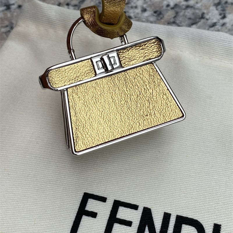Fendi Pico Peekaboo Charm in a gold/yellow