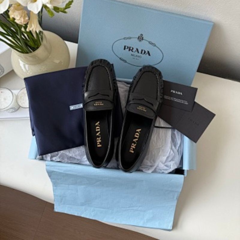 Prada Leather Driver Loafers in classic black ("Nero")