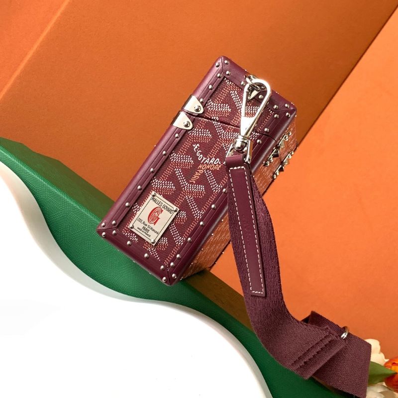 Goyard Cassette Trunk Bag in the rich burgundy