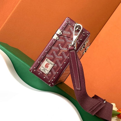 Goyard Cassette Trunk Bag in the rich burgundy