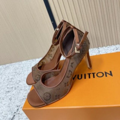Louis Vuitton Gala Sandals in brown.