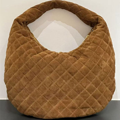 Saint Laurent Icare hobo antique gold-finished YSL maxi logo.