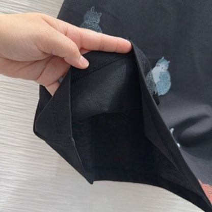 Louis Vuitton "Cats and Dogs" T-shirt in black.