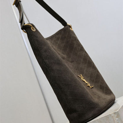 Saint Laurent Niki Supple Bucket Bag in brown quilted suede.