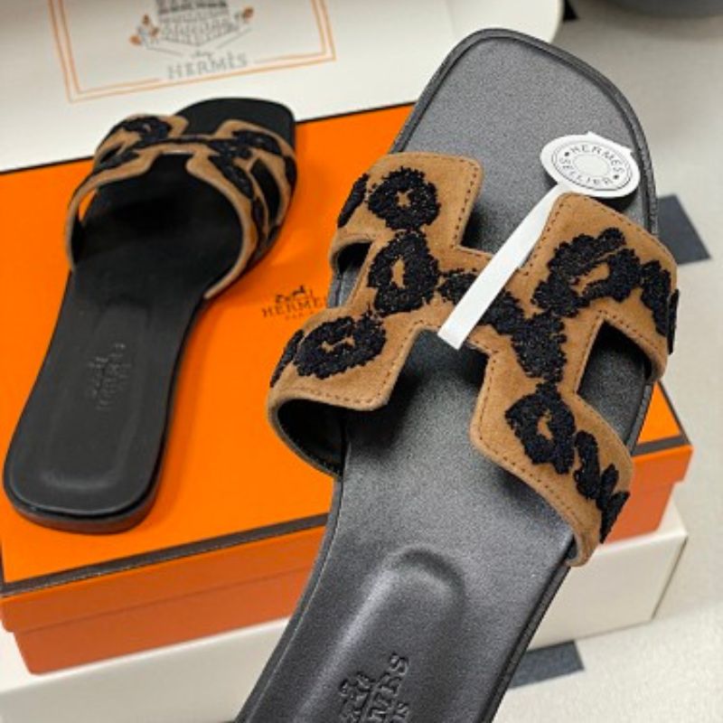 Hermès Oran sandals in a distinctive tricolor leopard-print design