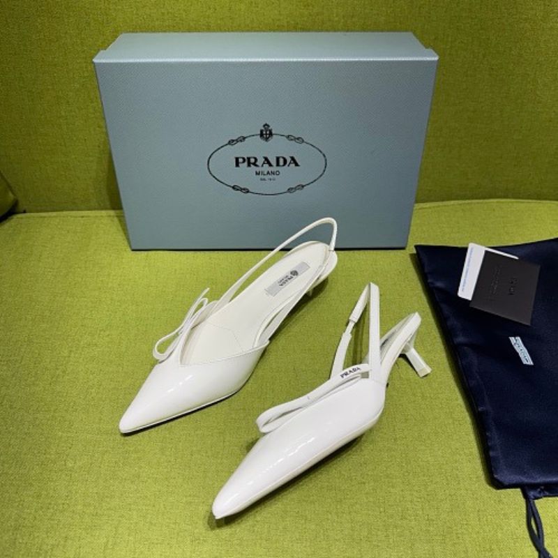 Prada Vernice Patent Leather Bow-Detail Slingback Pumps.
