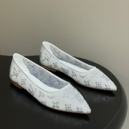 Louis Vuitton Gala Flat Ballerinas in white.